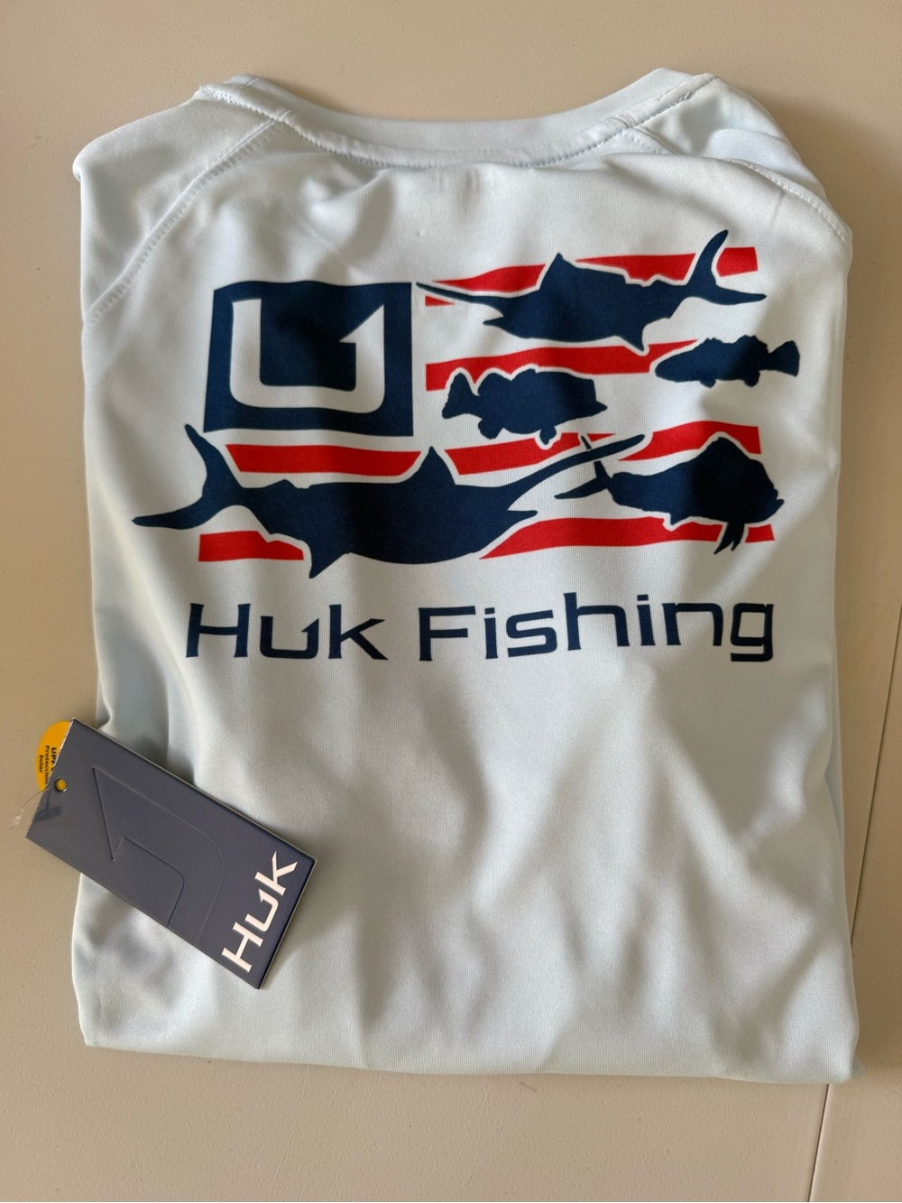 Huk Light Blue Performance Shirt with Navy Tag